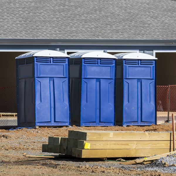 what is the cost difference between standard and deluxe portable restroom rentals in Herndon